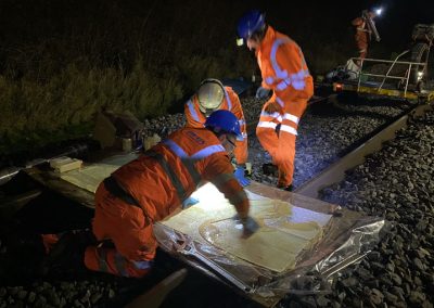 Patch Repair on site, at night working on a trail track