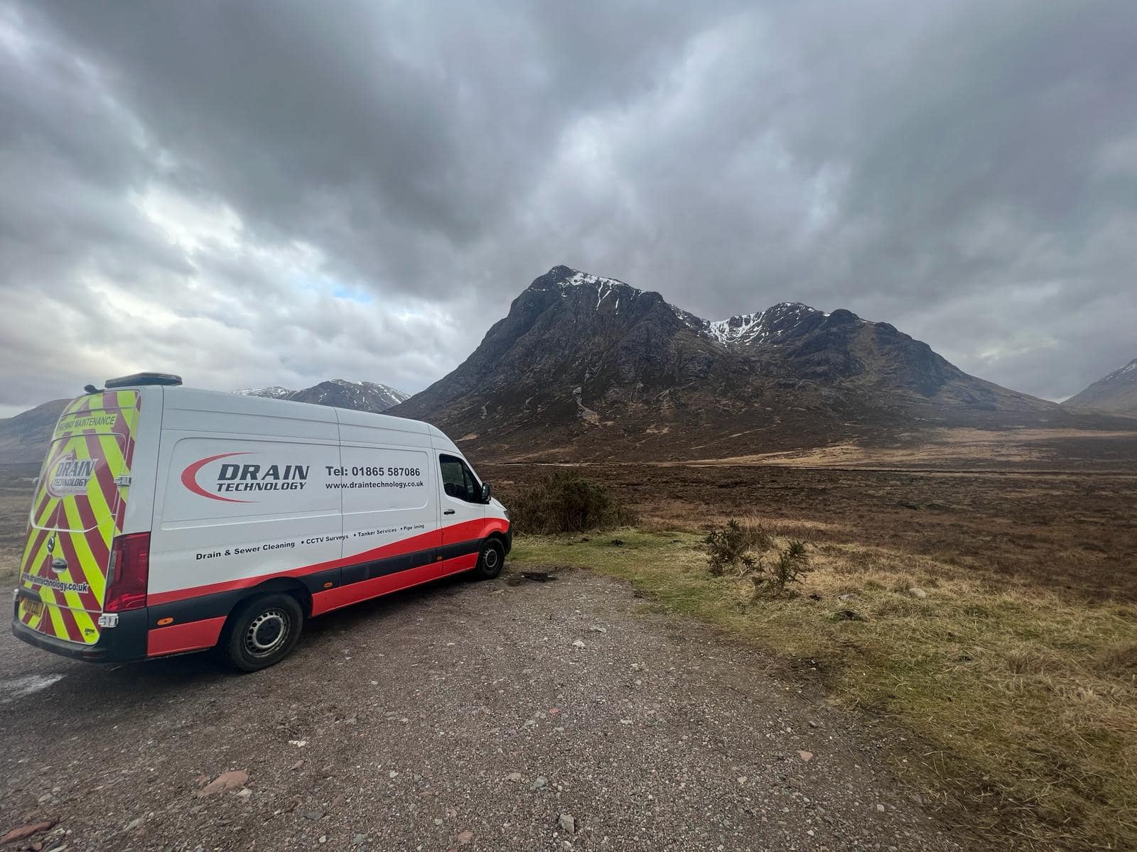 Drain Technology van in front of Scottish mountain range