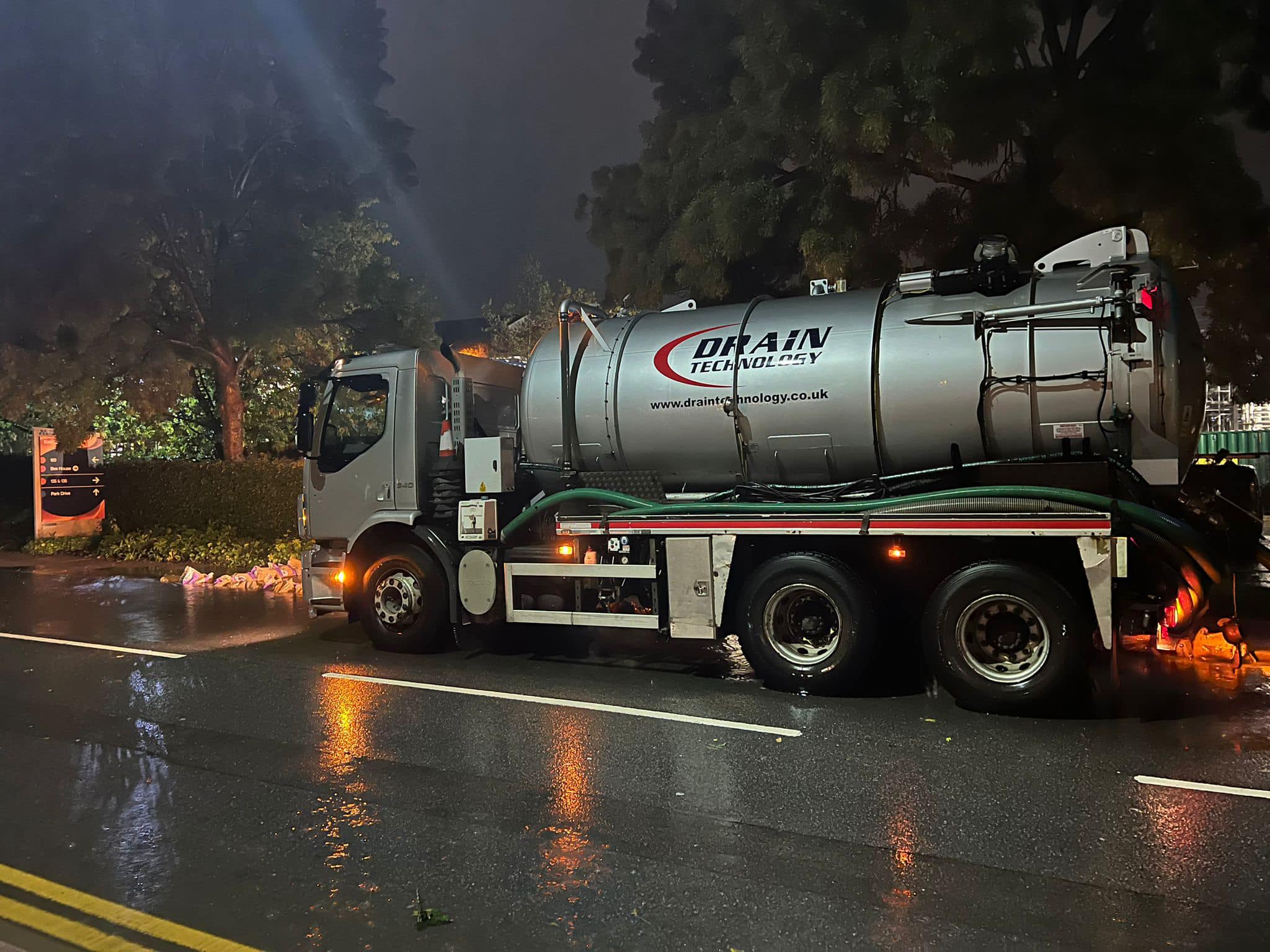 Drain Technology tanker on a rainy night