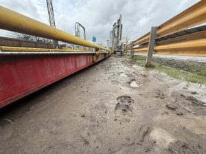Weighbridge cleaning by Drain Technology, on a wet and cloudy day.