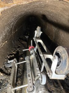 Cleaning tools on wheels in an underground pipe. 