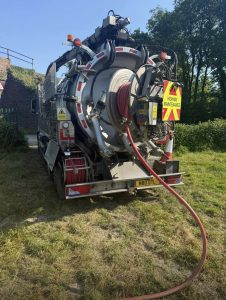 Drain Technology tanker in a field