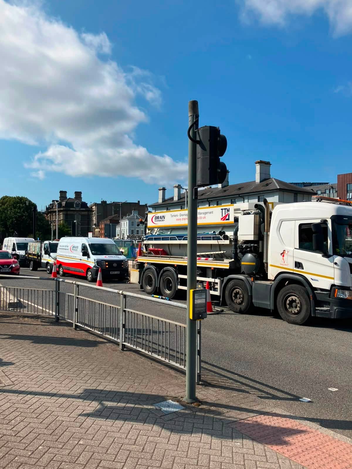 Fleet of vehicles on a busy street