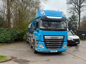 blue lorry in a car park