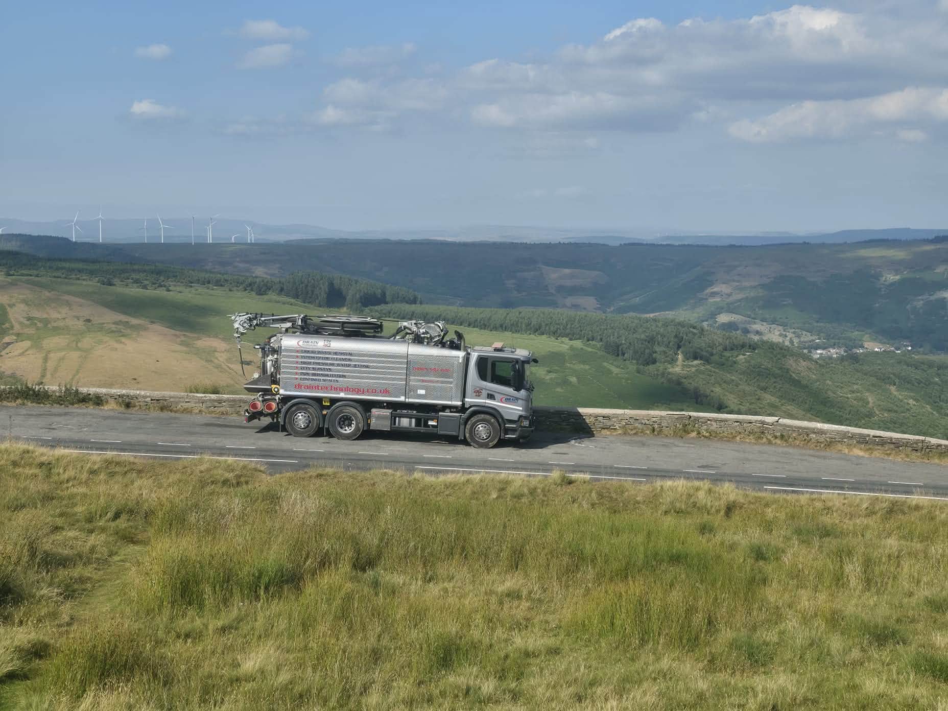Grey lorry in the hills