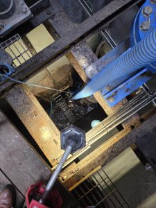 pipes and wires leading to a sewer
