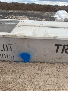 concrete bloc with writing on the side