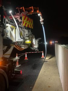 a tanker in the dark on the road side